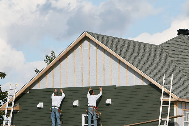 Professional Vinyl Siding technician working in Long Beach, MD